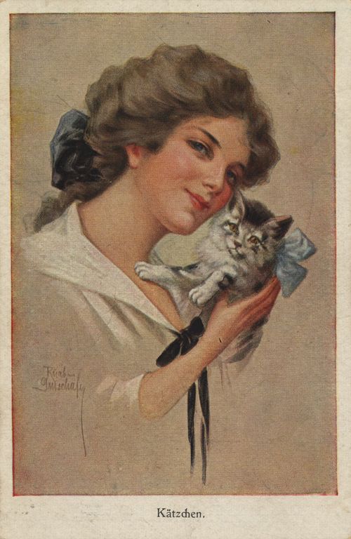 Brnette Frau mit getigerter Katze