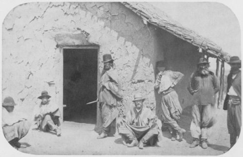 Panunzi, Benito: Gauchos vor einer Lehmhütte